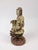 Hand carved wooden sitting Goddess of Mercy on a lotus stand. The Goddess of Mercy or Guan Yin is the goddess of...