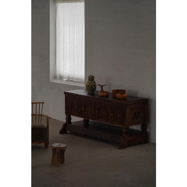 A rare and characterful Danish Baroque piece dating from the 18th century, originally constructed as a traditional oak...