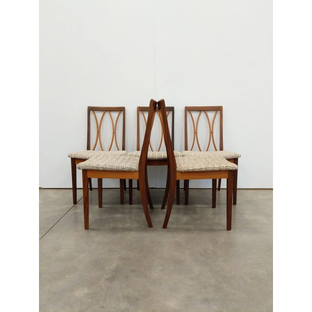 Set of 5 authentic vintage mid century modern dining chairs. By G Plan. Maker's label on bottoms. This set is in excellent...