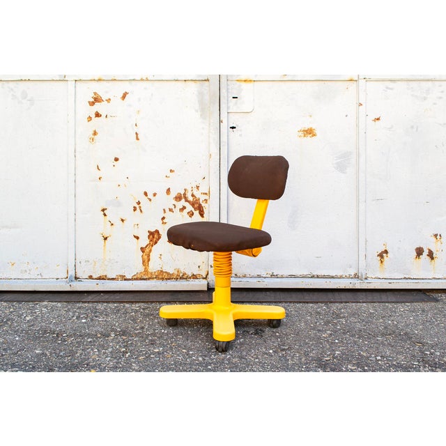 Office chair with aluminum frame and fabric-covered padding, plastic details. Original upholstery left underneath....