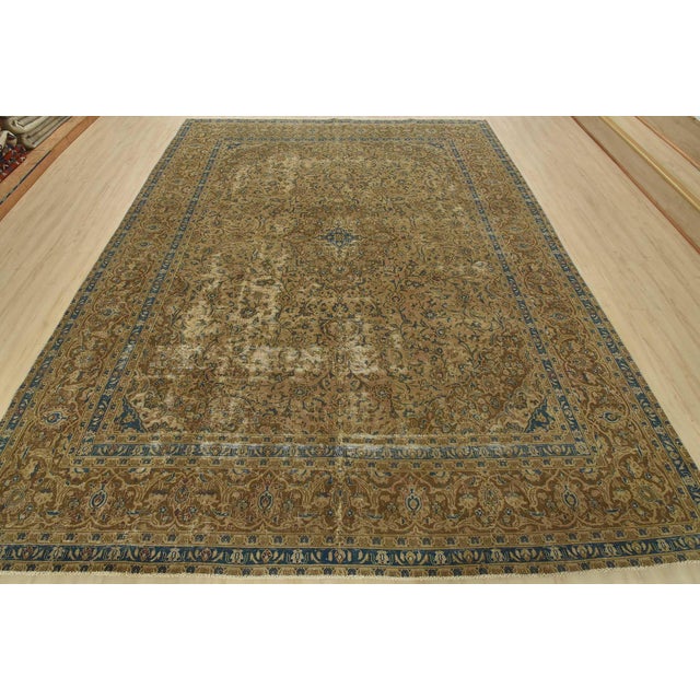 An authentic vintage traditional Kashan rug hand-knotted with an all-wool pile on a cotton foundation. This oriental rug...