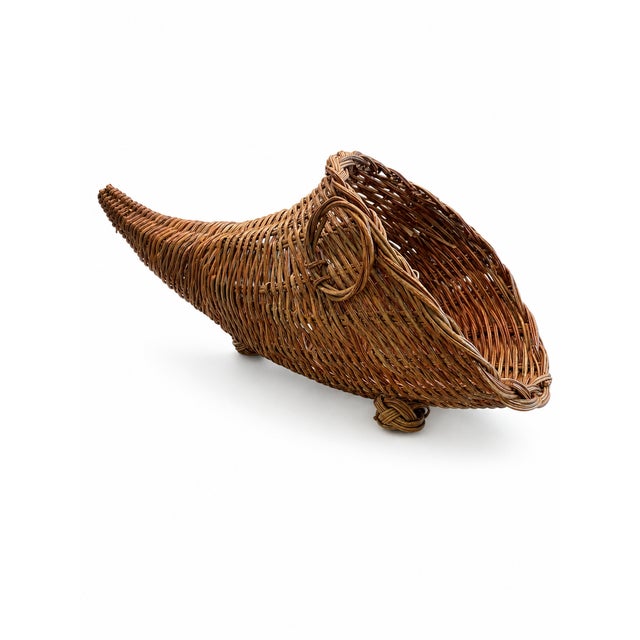 Add a touch of timeless warmth to your tabletop with this beautiful vintage cornucopia centerpiece, dating back to the...