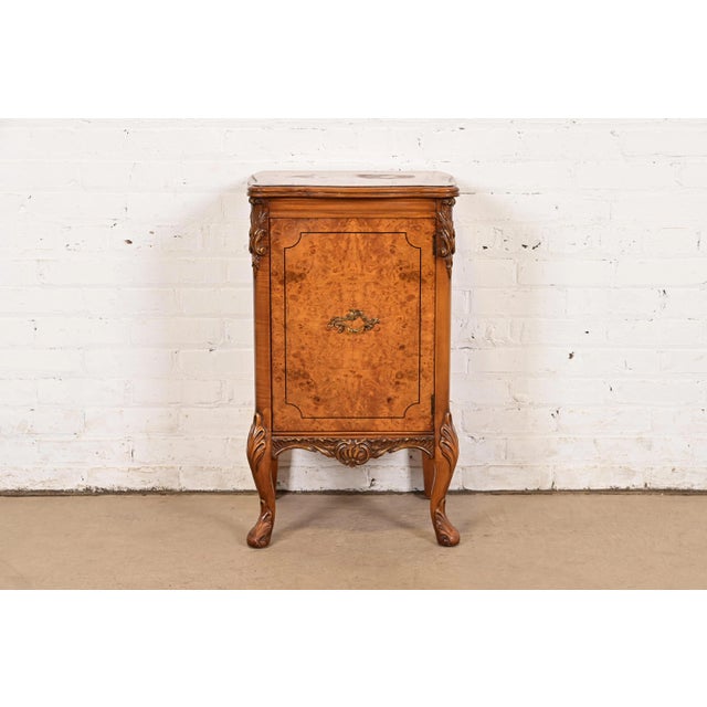 A gorgeous French Provincial Louis XV style nightstand or side table By Romweber USA, Circa 1920s Stunning exotic burled...