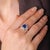 This striking Mid Century cocktail ring is a bold celebration of color, brilliance, and refined 1950s glamour. At its...