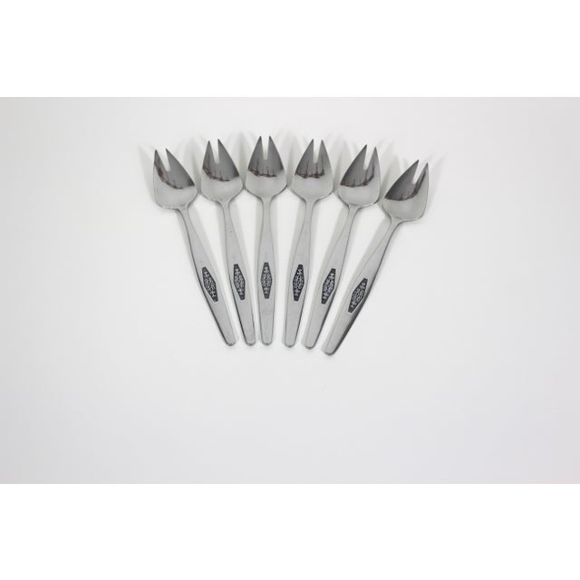 Vintage set of six ice cream forks or buffet multifunctional utensils in stainless steel with a fantastic mid century...