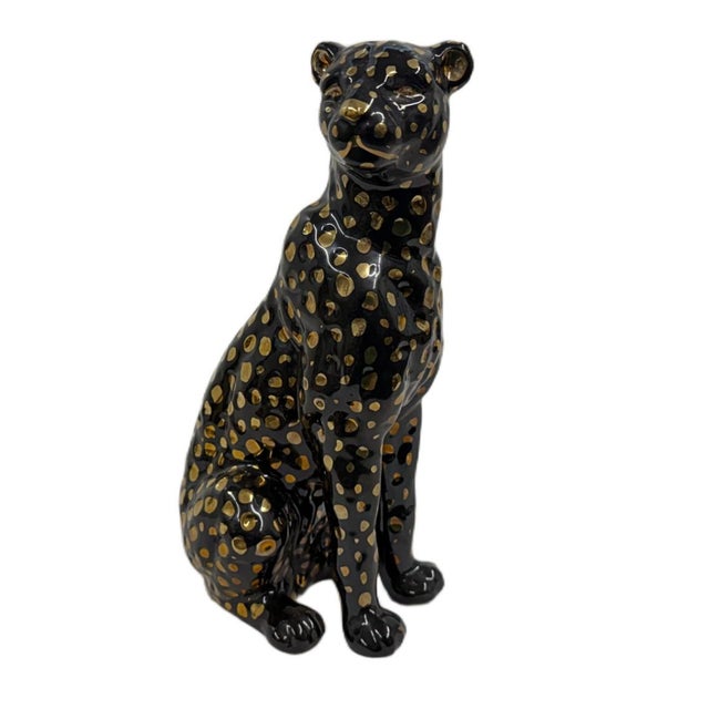 Contemporary Art Deco Style Seated Black and Gold Ceramic Leopard Sculpture Bring an elegant flash of maximalist style to...