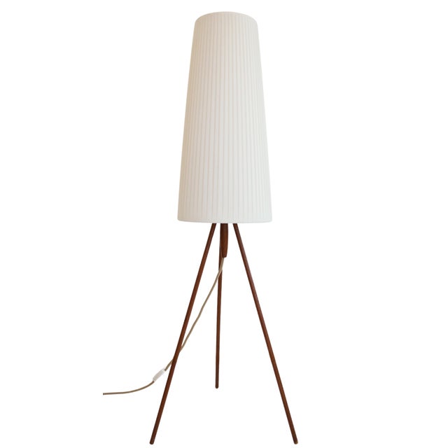 Elevate your living space with this exquisite mid-century Scandinavian tripod floor lamp, a stunning piece that embodies...