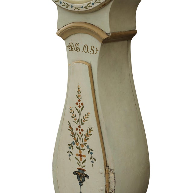 Swedish Mora clock with hand painted decorative floral details and clockmakers initials BEOS. Working Longcase clock...