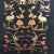 Vintage embroidered Asian textile fragment from a Chinese Opera Robe with Chinese Cranes in nature.