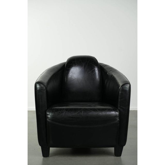 This comfortable, Aviator-style designer armchair made of cowhide leather offers exceptional seating comfort and features...