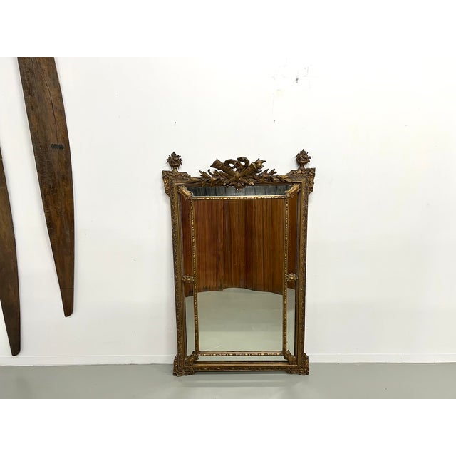 Maison lecan presents this large mercury mirror from the napoleon iii period (circa 1860-1880), made of wood and gilded...