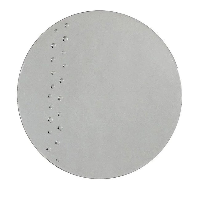 Large and beautiful round crystal wall mirror with cut edges and optical dot decoration on the inside of the glass....