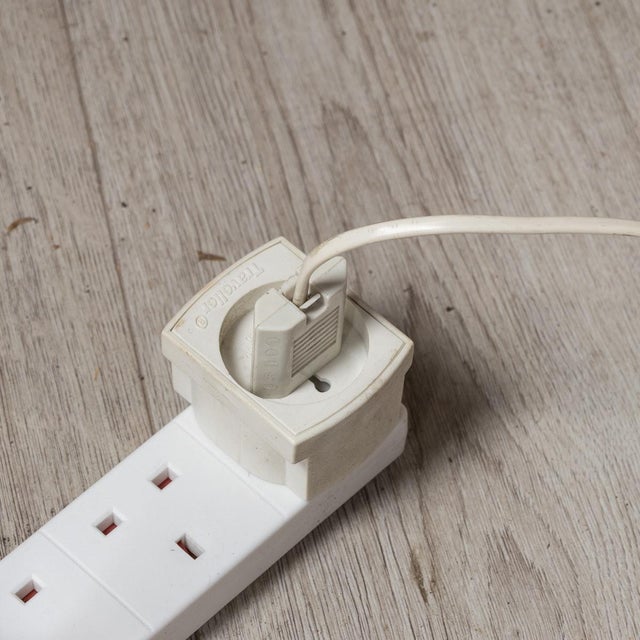 An elegant chrome and glass floor lamp made in Italy around the middle of the 20th century. The white lacquered stand...