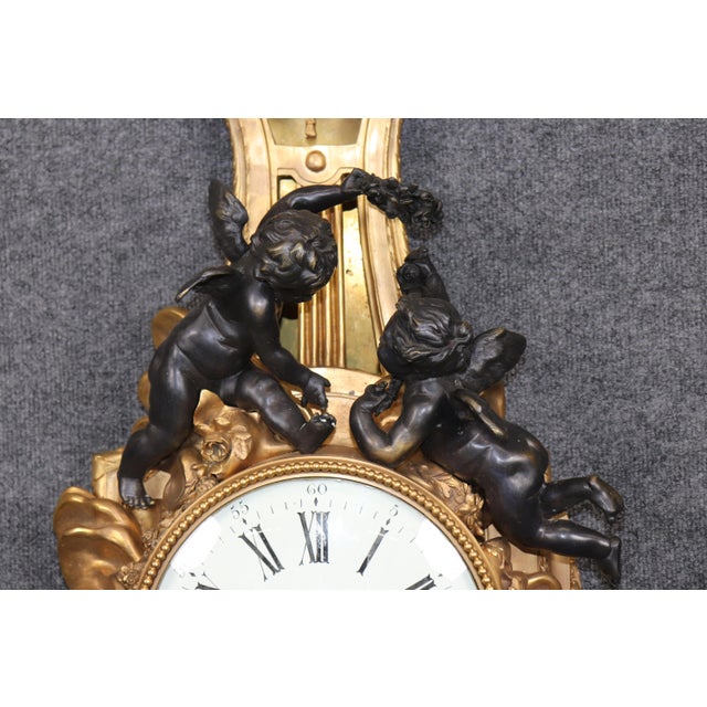 Baguès Rare Eugene Bagues Dark and Bright Bronze French Cartel Clock With Putti For Sale - Image 4 of 11