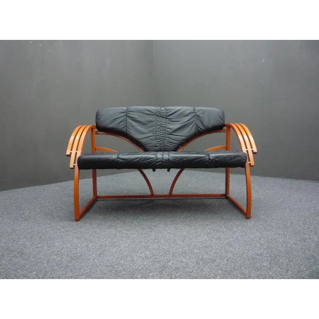 Futuristic Sofa from Eastern Europe. Very elegant design from the 70s or 80s. Seat and backrest covered with genuine...