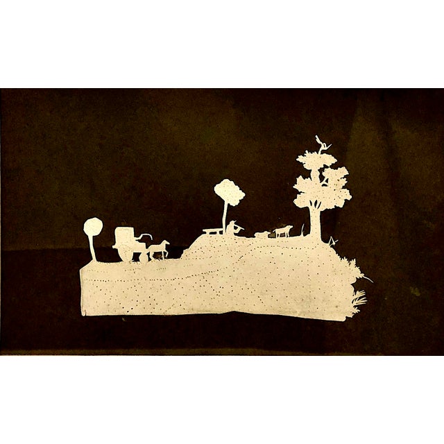 This artwork is a traditional piece of papercut silhouette art (often referred to as Scherenschnitte or découpage) that...