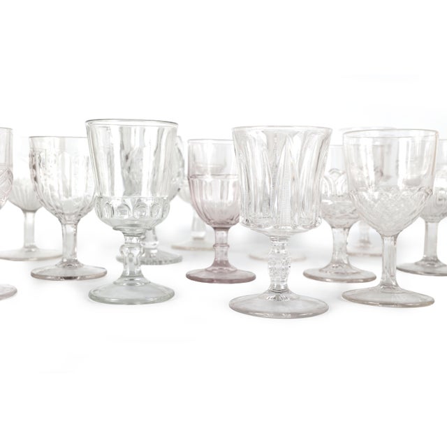 Fantastic set of 14 mismatched clear water or wine goblets by various makers. Great for weddings, special gatherings or...