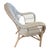 Part of a Wicker Set are these pair of side chairs, The set is crafted from white rattan, wicker, and bentwood, embodying...