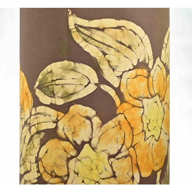 A striking and expressive table lamp, likely produced in Italy during the 1970s, combining a sculptural chrome-plated base...