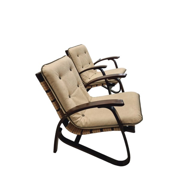 A pair of solid beech wood armchair with modern curved armrests and feet. They were produced in the 1930-1940s by the Up...