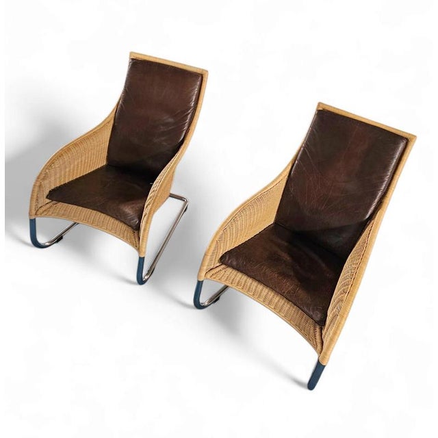 2 x Weighty rattan lounge chair 1990s / brown leather cushions Very good condition Width 70 Depth 90 Height 105 cm