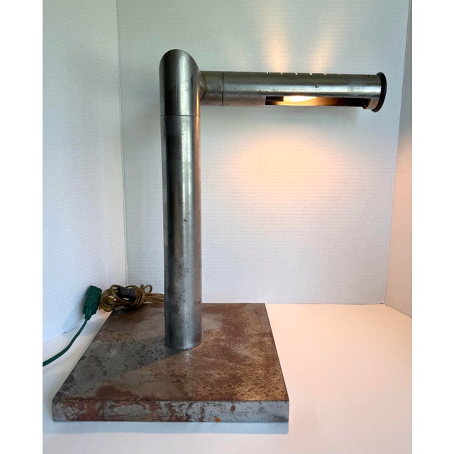 Here is a fabulous 1960s Industrial Modernist adjustable task lamp, attributed to Italy based on its design and...