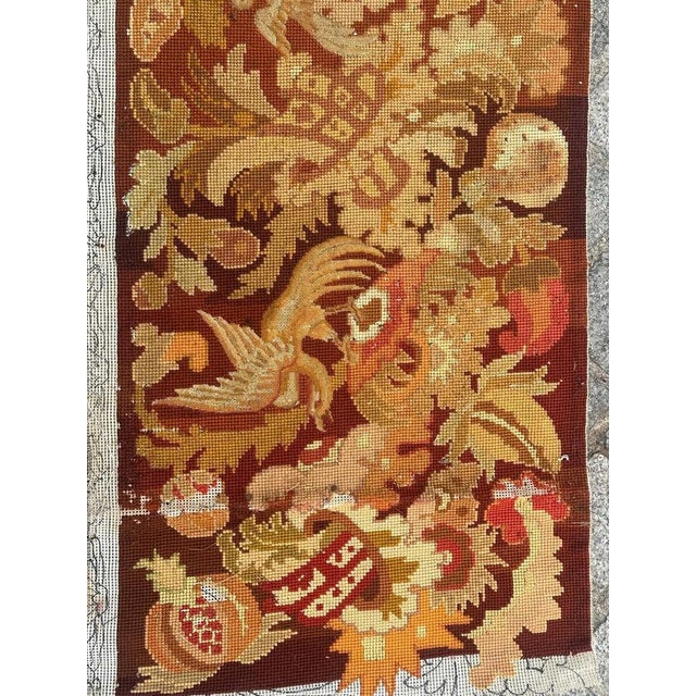 Beautiful late 19th century needlepoint tapestry in the form of a stripe or border fragment, with nice floral design and...