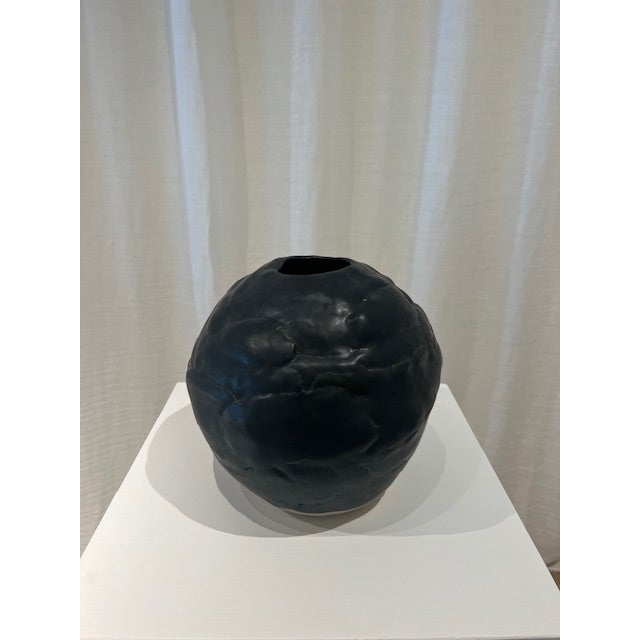 Dimensions: 9.5” diameter x 8.5” h Material: stoneware Finishing: unglazed Color: black Edition: one-of-a-kind