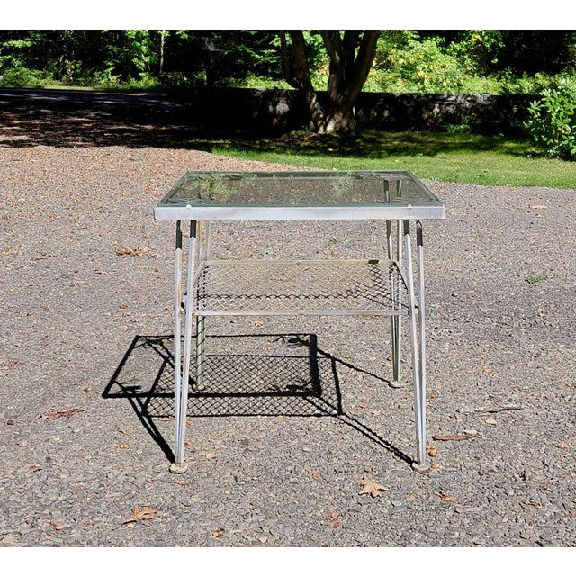 Woodard Pinecrest side table. It is 24.5" x 24.5" and 24.5" high. Light rust with paint loss and wear to the glass. Sturdy...