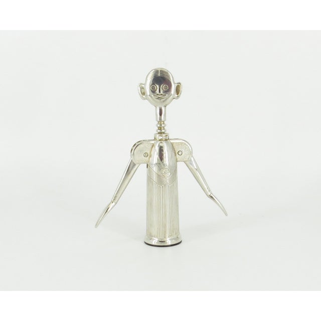 "Pierre Le Sommelier" corkscrew was designed by Aldo Columbo in Italy during the 1980s. The figural bar tool is silver-...