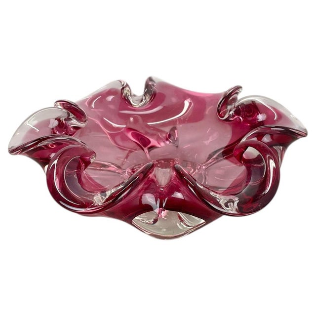 Article: Murano glass bowl, ashtray element Origin: Murano, Italy Decade: 1970s This original glass shell bowl was...