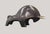 A contemporary abstract bronze of a bull, the animal reduced to a single massive, rounded volume balanced on short, bowed...