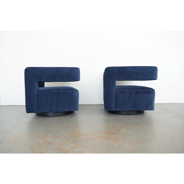 The Drew Swivel Chair is a statement in modern design and comfort. Defined by its bold geometric form and sculptural open-...