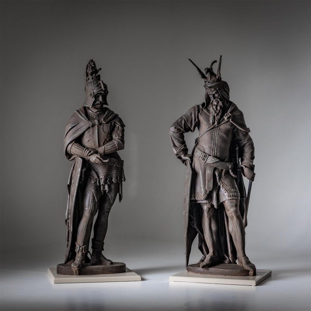 Two nearly life-size cast iron statues with rich detail and bronze patina. Dimensions left: 153 x 60 x 40 cm Dimensions...