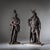 Two nearly life-size cast iron statues with rich detail and bronze patina. Dimensions left: 153 x 60 x 40 cm Dimensions...