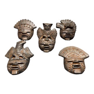 A Set of Five Vintage Colombian Terracotta Decorative Masks. For Sale