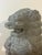 A striking pair of vintage hand carved stone Foo Dogs, also known as Guardian Lions, featuring exceptional hand carved...