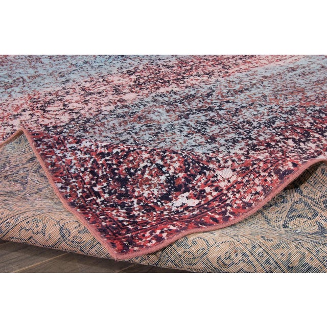 Vintage hand-knotted Overdyed rug with an all over motif. This piece has great detailing and a beautiful design. It would...
