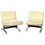 Pair of chrome frame low chairs with naugahyde covered cushions.