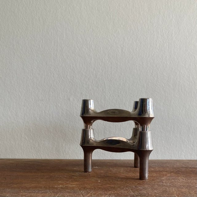 Set of two vintage Nagel candlesticks. In good condition with some minor signs of age. Dimensions: Height 7 cm, Width 11...