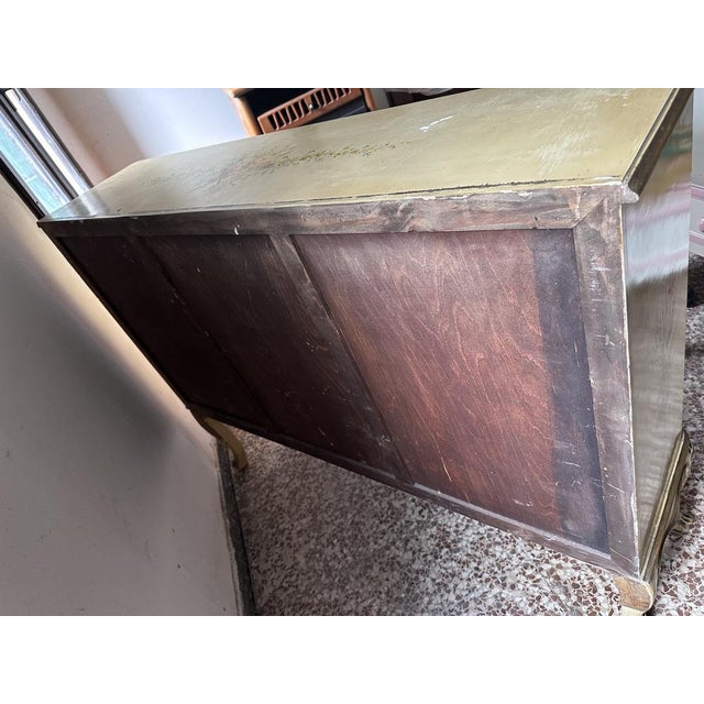 Belief/pantry/Venetian Buffet Baroque in yellow painted wood and floral designs on all sides. The front has four central...