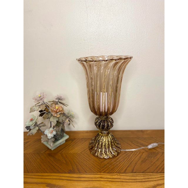 This 1970s boviar Murano table lamp is unique in all aspects. It light pink glass with gold specs throughout give a...