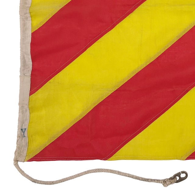 This vintage nautical signal flag is fully sewn from a thin cloth, possibly a blend of wool and synthetic fiber. Please...