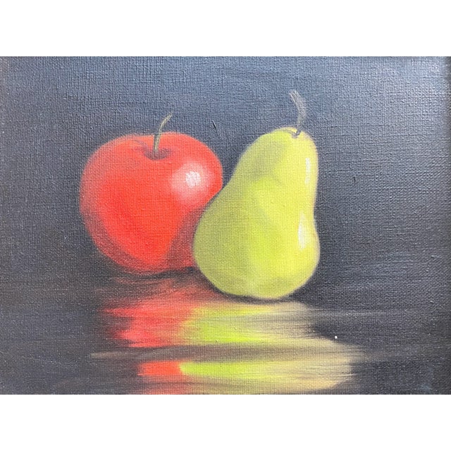 Red apple, green pear. Beautiful and meaningful oil on canvas. in gilt wood frame, and in excellent condition with natural...