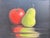Red apple, green pear. Beautiful and meaningful oil on canvas. in gilt wood frame, and in excellent condition with natural...