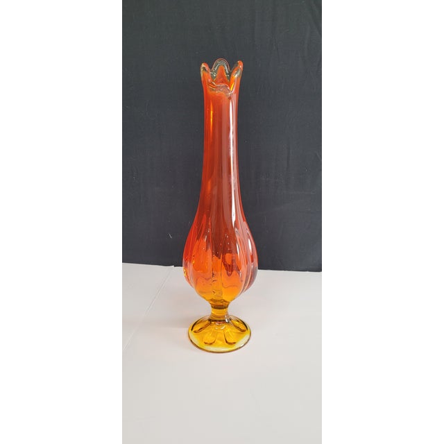 Mid Century Modern Art Glass Swung Bud Vase Stretch Orange In good condition, hand blown with factory irregular bubbles...
