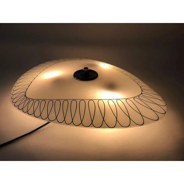 Glass wall lamp from designfornication. This is our own design based on a vintage glass plate, that was produced in...