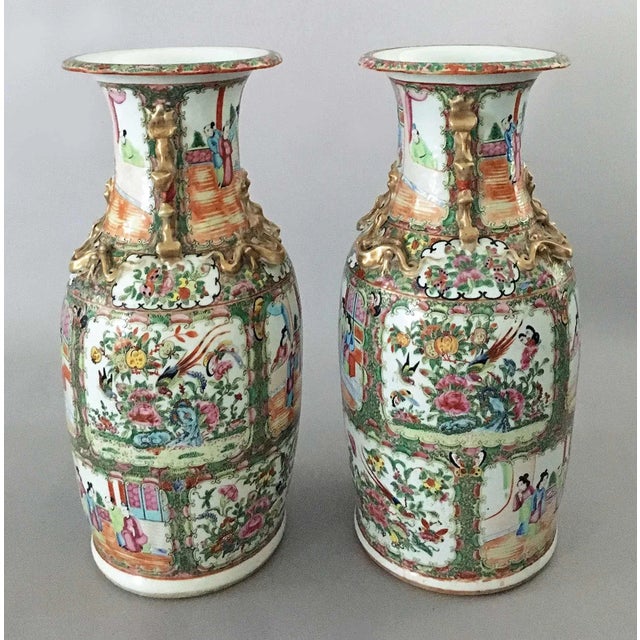 Pair of Chinese Export porcelain rose medallion tall open vases with applied gilded foo dog handles and dragons to neck...