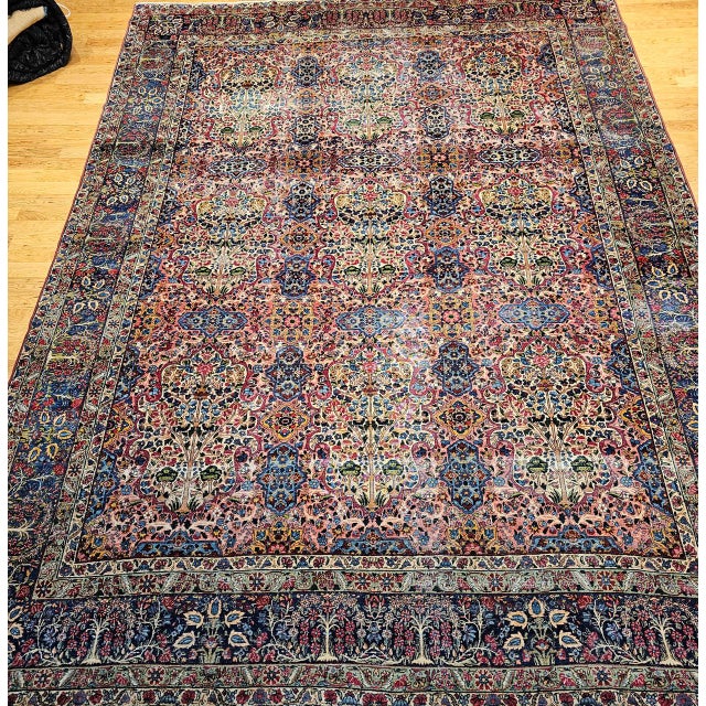 "An outstanding early 20th century Persian Kerman Lavar carpet featuring the beloved Tree of Life design — one of the most...