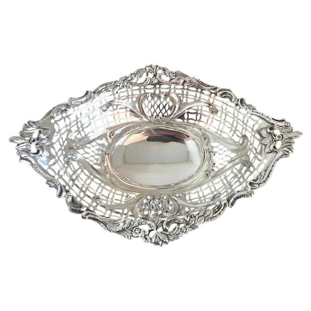 A fine late Victorian sterling silver bon bon or trinket dish by the celebrated London silversmith William Comyns, fully...